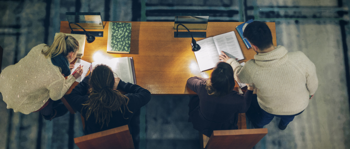 Group of Students Studying in a Library
